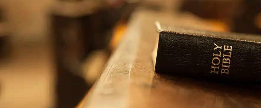 Bible on church pew